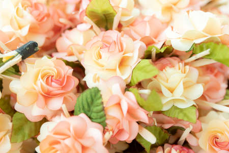 color cute beautiful artificial flowers backgroundの写真素材