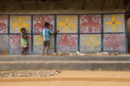 traditional tribal mud house and colourful wall abstract photographyのeditorial素材