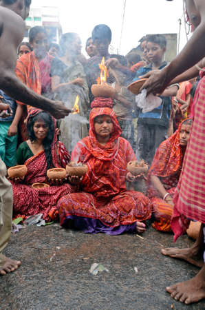 kolkata west bengal india on may 10th  2014:Devotees perform various rituals during this event for well being their family. Sitala is the Goddess of sores, ghouls, pustules and diseases.のeditorial素材