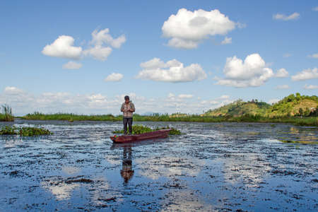 moirang manipur india on 3rd november 2018: image of loktak lake landscape & fishing boat.のeditorial素材