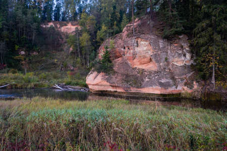 Sandstone outcrops. Zvartes Rock on the bank of Amata river.の写真素材