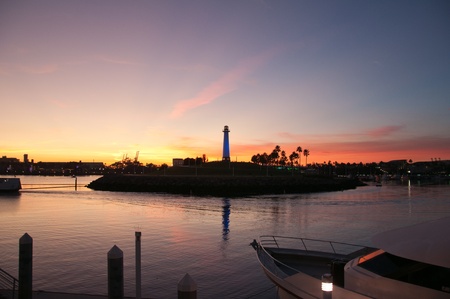 Long Beach marina lighthouse under a bright blue skyの写真素材