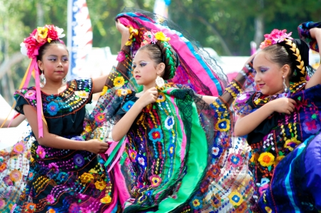 COSTA MESA, CA - JULY 24: Unidentified Mexican dancers perform in traditional costumes on stage at the Orange County State Fair in Costa Mesa, CA on July 24th 2010.のeditorial素材