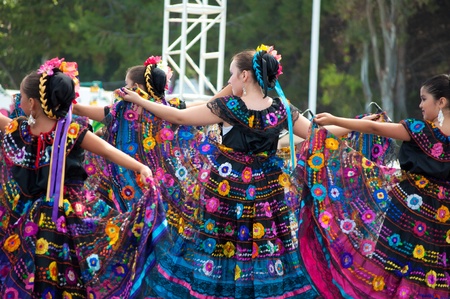 COSTA MESA, CA - JULY 24: Unidentified Mexican dancers perform in traditional costumes on stage at the Orange County State Fair in Costa Mesa, CA on July 24th 2010.のeditorial素材