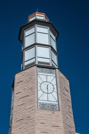 City market clock tower under bright blue skyのeditorial素材