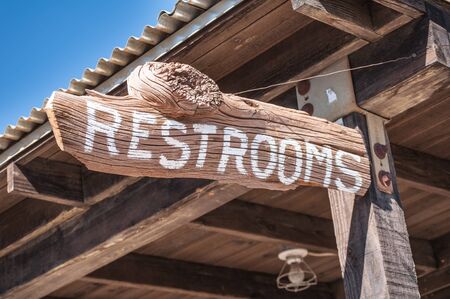 Wild old west restroom signの写真素材