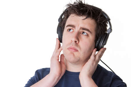 man pays his attention to the music on his headphonesの写真素材