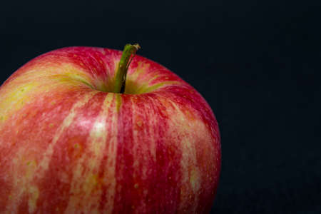 Red Apple isolated on a black background