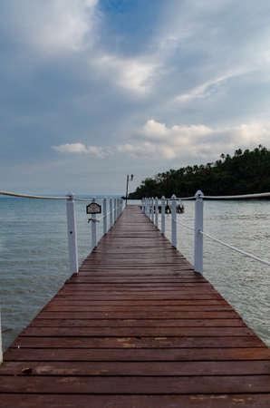 Footbridge over the ocean in the Dominican Republicの写真素材