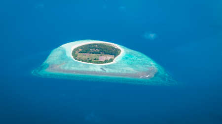Maldives from the Sky with the blue sea and white sand and beach in the indian oceanの写真素材