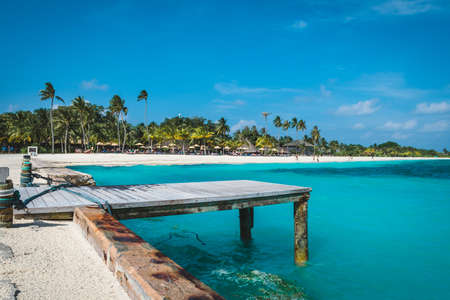Jetty at the Maldives with turqoise water and blue skyの写真素材