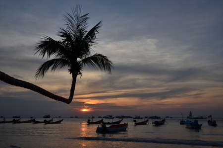 Beautiful sunset at the beach of Ko Tao in Thailandの写真素材