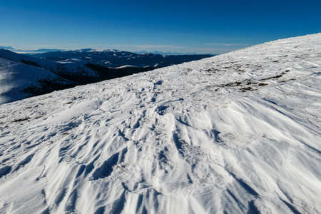 A close up on the snow capped Alps in the region of Speikkogel in Austrian Alps. The whole are is...