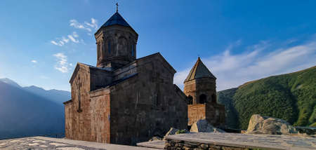 Close up view on Gergeti Trinity Church in Stepansminda, Georgia. The church is located on a high...