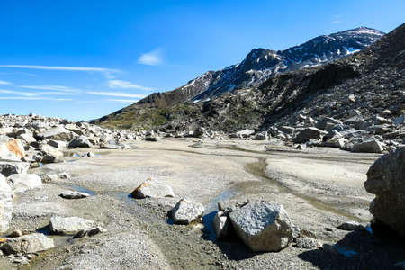 Melting ice from glacier lakes forming a river in the Hohe Tauern Alps in Carinthia and Salzburg,...