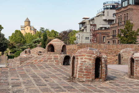 Domed roofs of sulfuric baths in the Abanotubani district of Tbilisi, the capital of Georgia. Royal...