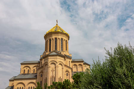 Panoramic view on the Metekhi Church above the Kura river in city center of Tbilisi, Georgia. Georgian architecture sightseeing centre. Old town. Ancient church and cathedral view.の写真素材