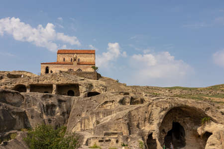 Ancient cave city of Uplistsikhe overlooking the Mtkvari river, in the Shida Kartli Region of Georgia, Caucasus, Eastern Europe. Church of the Prince at Uplistsikhe. Near Gori. Historical placeの写真素材