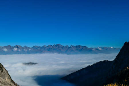 A panoramic view on Lienz Dolomites, Austria from the top of Grosse Gamswiesenspitze, bathing in the...