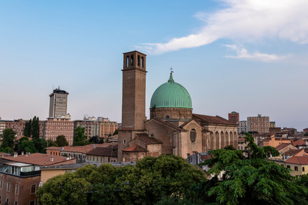 Scenic view on Basilica di Santa Maria del Carmine in Padua, Veneto, Italy, Europe. Roman Catholic church with tower in a Northern Italian city. Touristic sight seeing in Padova. The dome is greenの写真素材