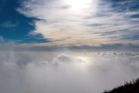 Panoramic sea view from Monte Comune on thick white clouds and blue sky near the coastal town Positano. Magical hiking above fog in Lattari Mountains, Apennines, Amalfi Coast, Campania, Italy, Europeの写真素材