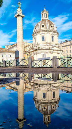 Water reflection of a pond after rain of dome of the Santa Maria di Loreto church. Cathedral of the Most Holy Name of Mary at the Trajan Forum. Landmark in the city of Rome, Lazio, Italy, Europe EUの写真素材