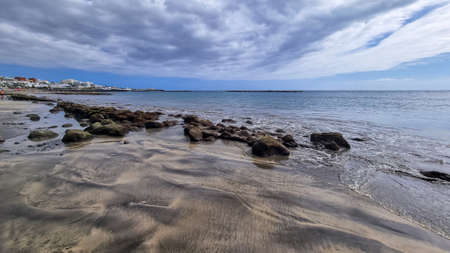 Scenic view on the drainage patterns at Costa Adeje beach on Tenerife, Canary Islands, Spain,...