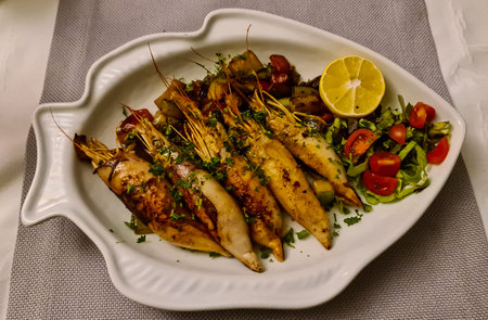 Seafood risotto in local luxury restaurant in coastal village Sveti Stefan, Budva Riviera, Adriatic...
