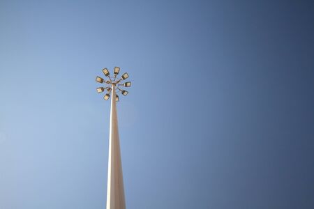 street lighting large pole light blue skyの写真素材