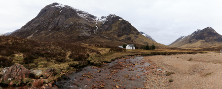 Remote white cottage at Glencoe, Scotland UK.の写真素材