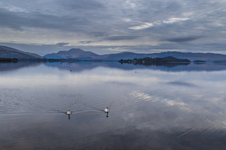 Calm and tranquil sunrise, Loch Lomond, Scotlandの写真素材