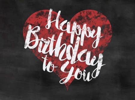 words happy birthday to you written on blackboard with red heartの写真素材