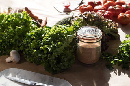 fresh groceries on a table in sunlightの写真素材