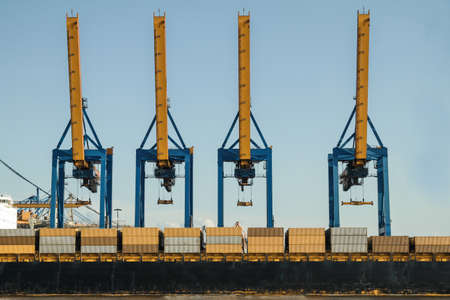 cranes and container during loading unloading in harborの写真素材