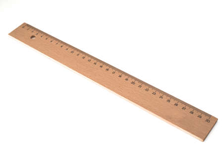 wooden foot rule ruler isolated on white backgroundの写真素材