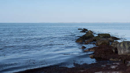 rocks in water of the baltic seaの写真素材