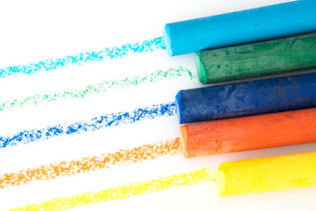 lines drawn with crayons on a white paper backgroundの写真素材