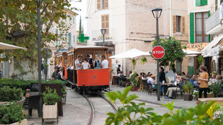 historic tram connecting the towns of Soller and Port de Soller on the island of Mallorca, Spain. Taken on Placa de Constitucion in Soller on 2017-11-01のeditorial素材