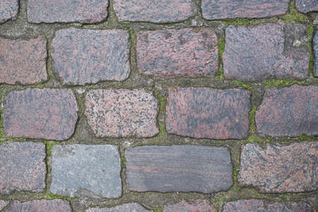 old cobblestone street surface texture backgroundの写真素材