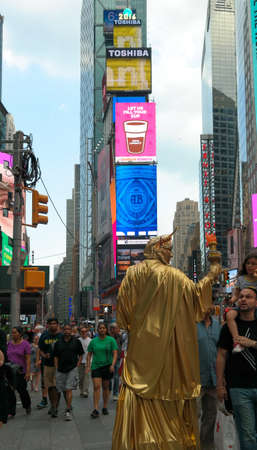 New York City, NY, USA 05.29.2016 lady liberty street performer and pedestrians on Times Squareのeditorial素材