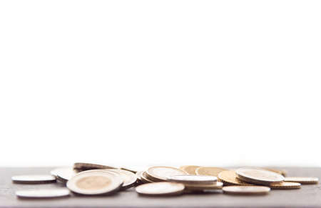 pile of Euro coins spread on flat surfaceの写真素材