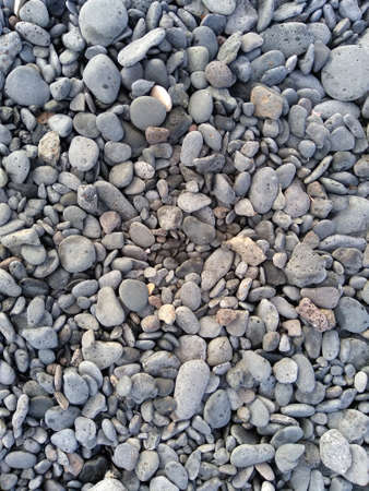 directly above shot of pebbles on a beachの写真素材