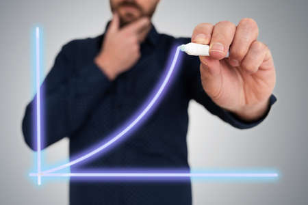 businessman drawing chart with pen on translucent screen success concept