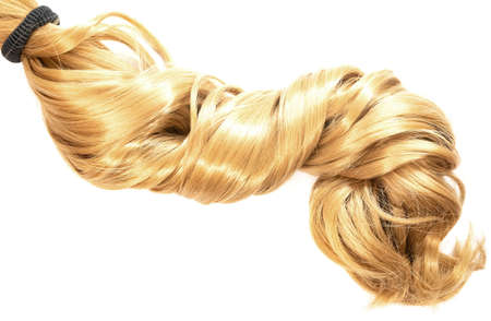long blond hair ponytail isolated on white backgroundの写真素材