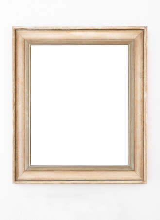 empty ornate picture frame hanging on wall background templateの写真素材