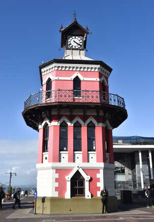 2018-09-13 Cape Town, South Africa: historic clock tower at Waterfront against clear blue skyのeditorial素材