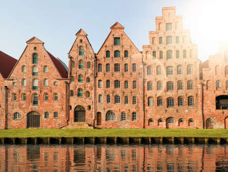 historic Salzspeicher warehouses in Lubeck, Germany against clear blue sky