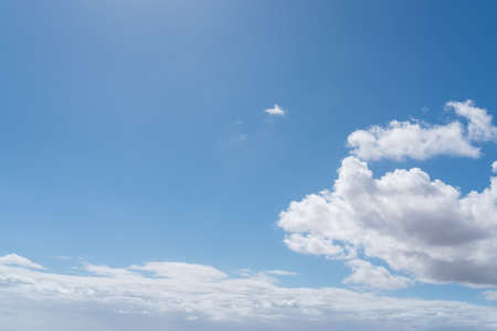 beautiful blue sky with white clouds on sunny day background