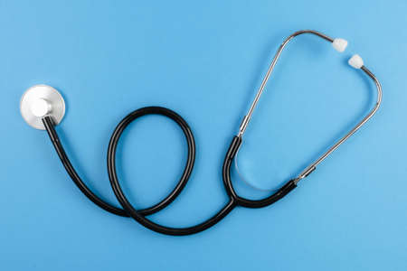 close-up top view of stethoscope on blue backgroundの写真素材