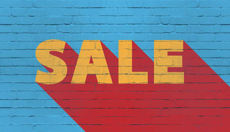 word SALE painted on blue stone wall, business marketing conceptの写真素材